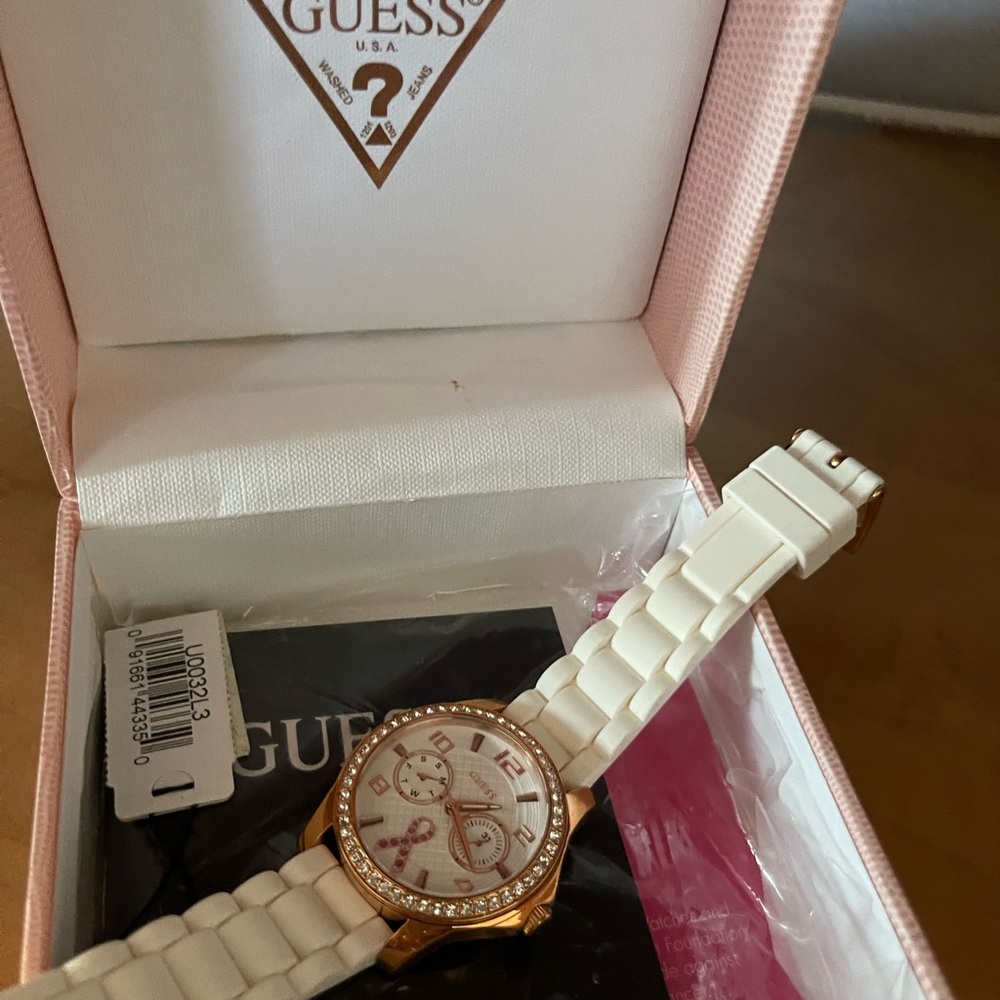 GUESS Women's White and Gold Watch
